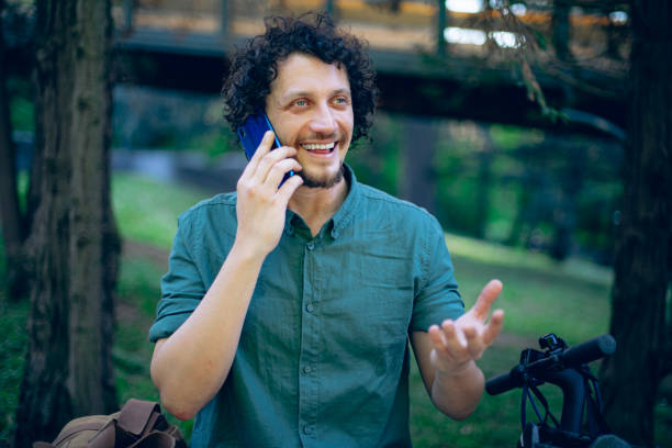 Young business man talking on phone