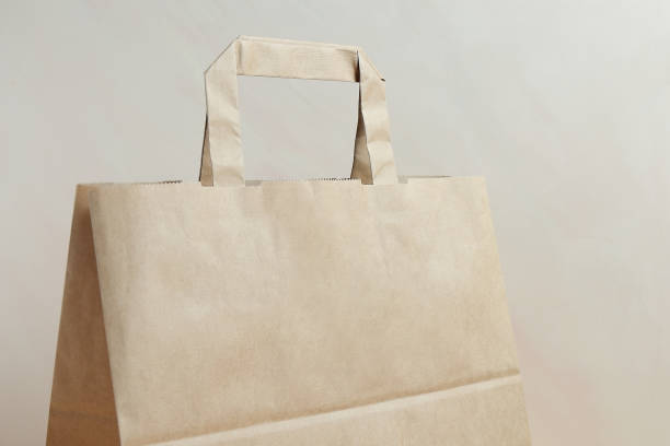 istock Brown paper bag, recyclable sack for shopping, mockup 2151618872