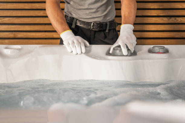 istock Hot Tub Technician Worker Performing Outdoor SPA Installation 2151619600
