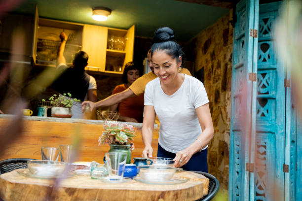 People sharing food and drinks in a restaurant
