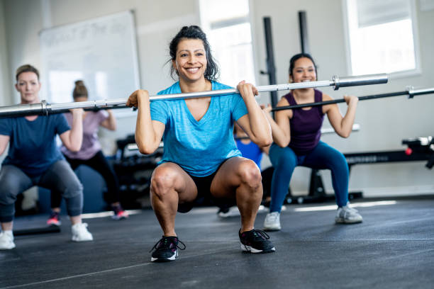 istock Women Weight Lifting 2151625141