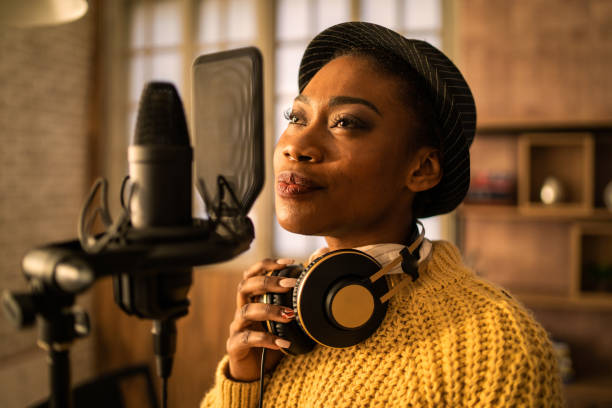 istock A singer standing close to a microphone 2151626957