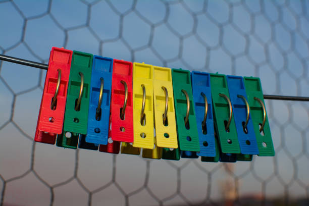 The sight of colorful clothespins can evoke a sense of nostalgia for simpler times when hanging laundry on the line was a daily chore for many. Today, some people still prefer to air dry their clothes to save energy and reduce wear and tear on fabrics.