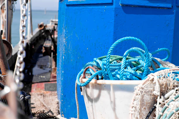 Pellestrina - Venice, Italy - April 28, 2024. Old fishing boat  in Venetian Lagoon.