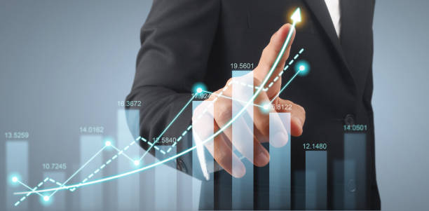 istock Businessman plan graph growth and increase of chart positive indicators 2151633273