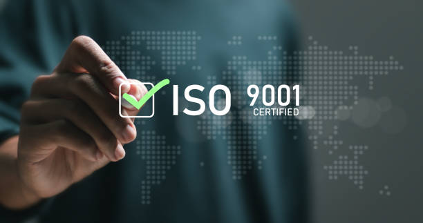 istock ISO 9001 Standard certification standardisation quality control concept, businessman choose ISO 9001 icons for certified and quality management of organizations. 2151633583