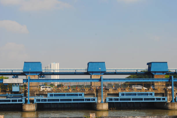 irrigation water rushing through a water canal gate