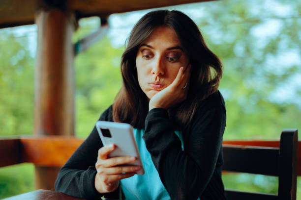 istock Surprised Woman Checking her Smartphone Feeling Stressed out 2151642681