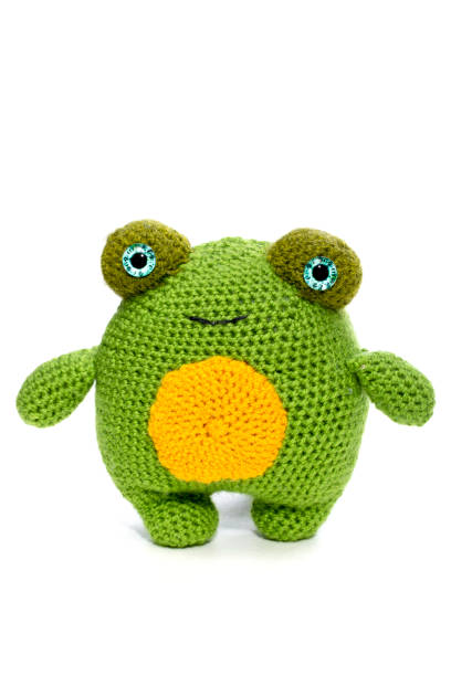 istock The frog is a soft knitted wool toy made of wool on a white background 2151643021