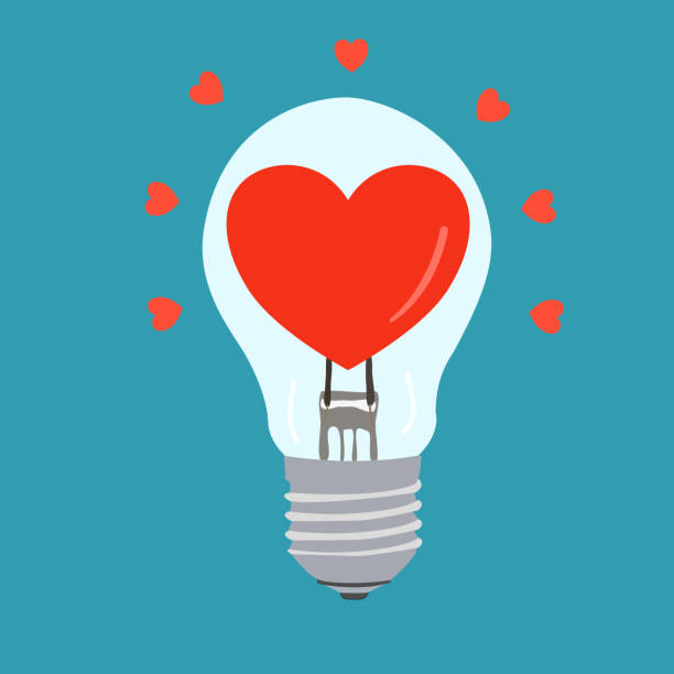 istock heart incandescent light bulb that sends the power of love to everyone 2151648859