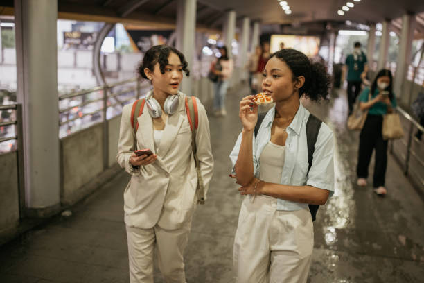 istock Friends chatting in the city 2151649240