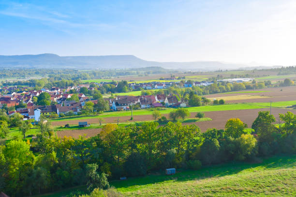istock A natural landscape with a small town on the horizon under a cloudy sky 2151652163