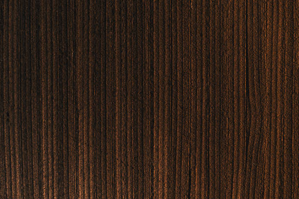 istock Striped pattern of ploughed farmland soil from drone pov 2151652512