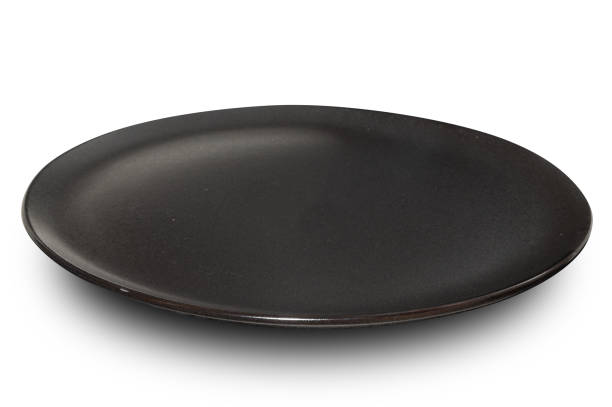 istock Black circle ceramics plate isolated on white background. 2151656029
