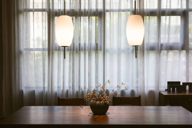 istock Vase and flowers on dining table 2151656456