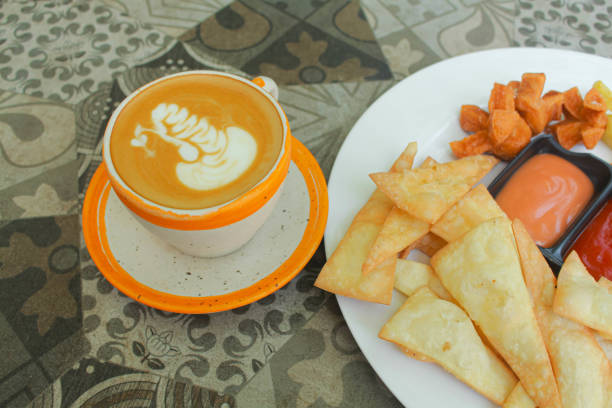 istock A cup vanilla latte coffee with mix plater snack 2151657719