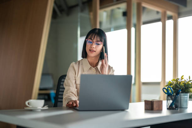 istock Professional Businesswoman Engaged in Work at Modern Office 2151658542