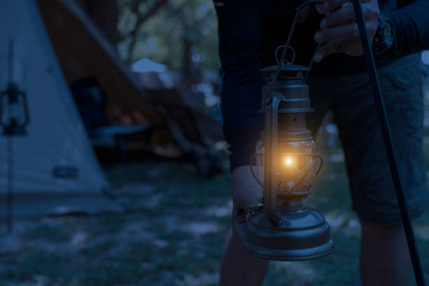 Light an oil lantern by the lake.