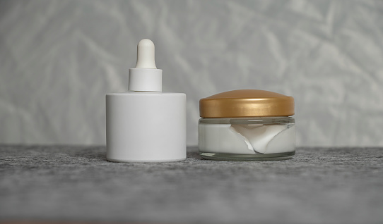 Skincare jar with cosmetic anti aging cream .