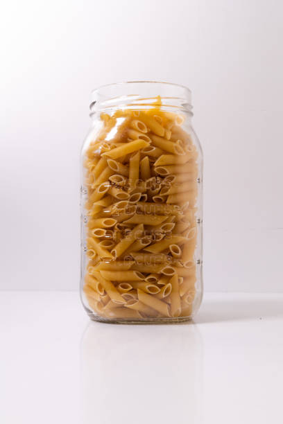 Photograph jar full of macaroni pasta food storage