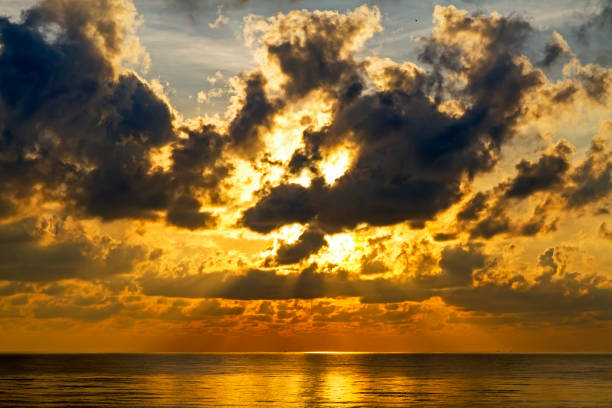 Sunrise on water in morning at beach Hat Ban Krut Prachuap Khiri Khan Province in Thailand is famous for travel and relax