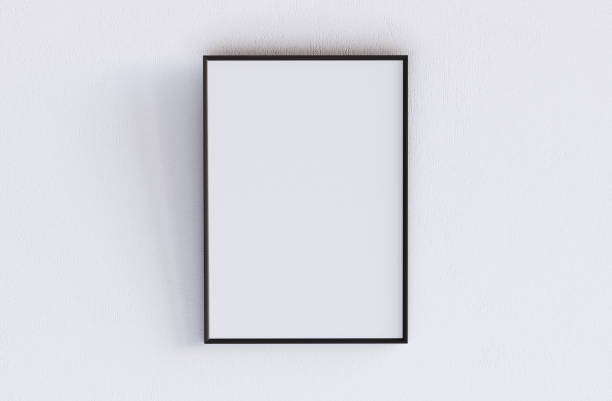 istock White blank poster with frame mockup on white wall 2151667168
