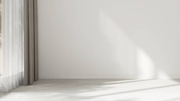 istock Empty white wall room in sunlight from window with sheer, blackout curtain, tree shadow on baseboard, wood laminated parquet floor 2151670237