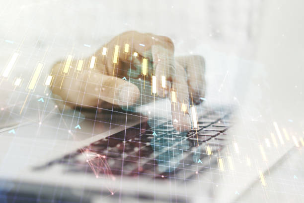 istock Multi exposure of abstract financial diagram with world map and with hand typing on computer keyboard on background, banking and accounting concept 2151671880