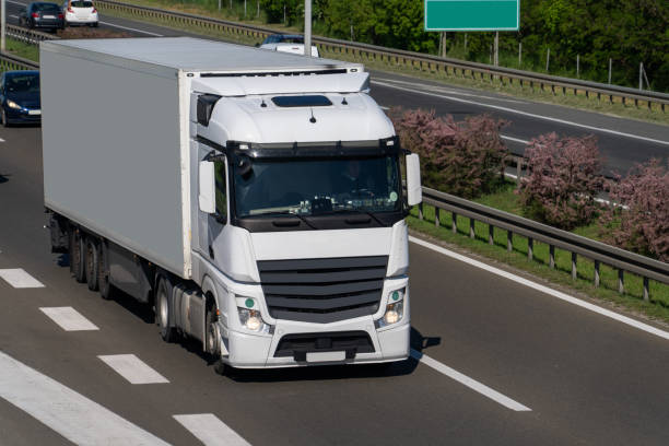 istock Semi truck with trailer on the highway. 2151677159