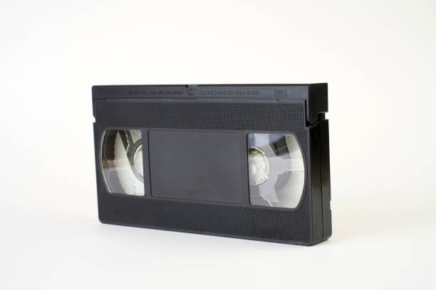 istock Video cassette tape on white background, close-up 2151677439