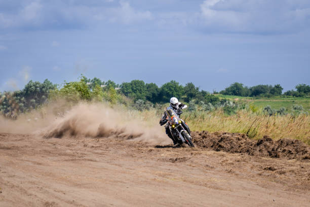 istock Extreme Motocross track. Riding on dust track 2151679098