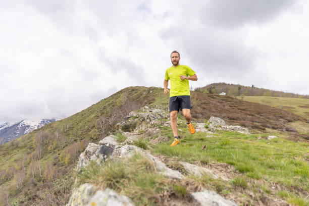 istock Hiker in Motion: Trail Running in the Mountains 2151680605