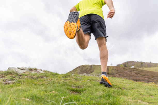 istock Stride and Conquer: Hiker's Determined Climb on a Mountain Trail 2151680704