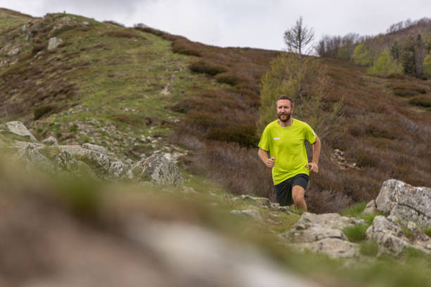 istock Trail Runner in Natural Setting Through the Hills 2151680727