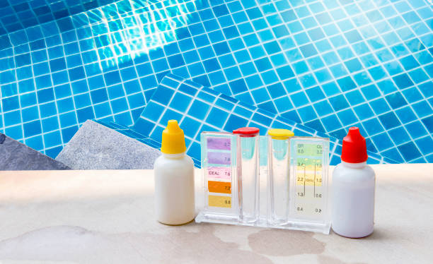 istock Water tester test kit on swimming pool edage 2151681530