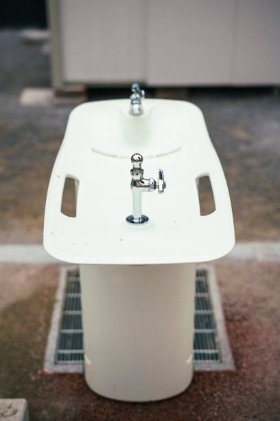 Water filling an inviting hot tub tub.