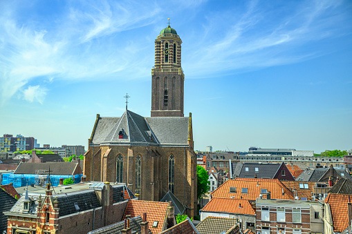 Zwolle springtime rooftop view with the Peperbus church tower in the Zwolle downtown district during a springt day. Seen from above we can see various historical buildings from the rooftop of the Grote Kerk.