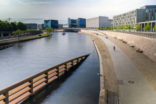view on spree river in modern central Berlin at sunny day
