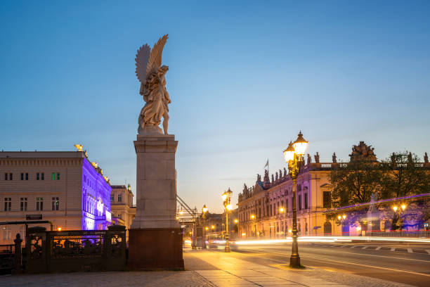 view on Berlin street Unter den Linden at sunset hour