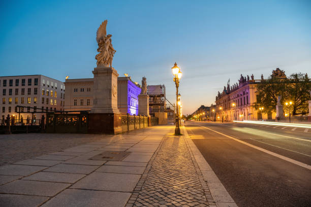view on Berlin street Unter den Linden at sunset hour