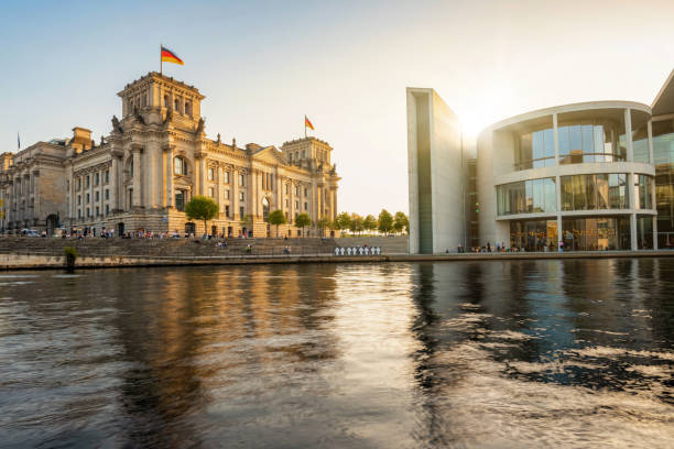 istock government district at spree river in Berlin at sunset 2151686655