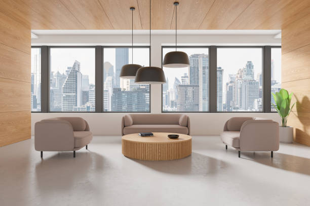 istock Wooden business interior with soft place and coffee table, panoramic window 2151686876