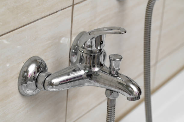 istock Silver shower faucet in the bathroom 2151687938