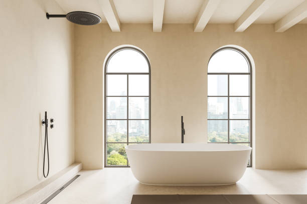 istock White bathroom interior with tub and shower 2151688133