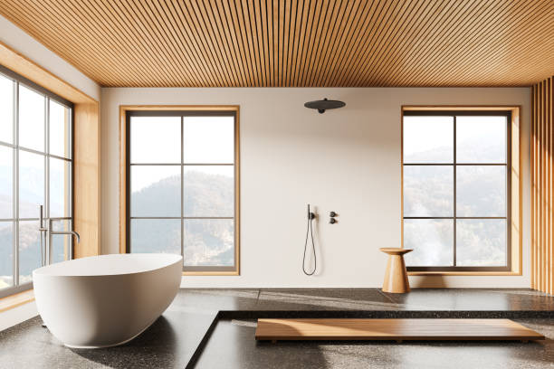 istock Beige hotel bathroom interior with tub, douche and panoramic window 2151688404