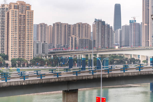 Chongqing, China - August, 9, 2021: Monorail Metro Passing Through a Residential Buildings