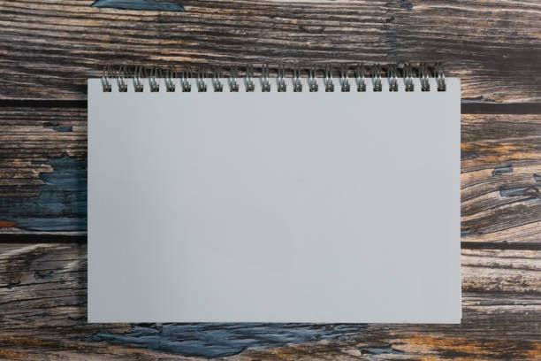 istock Blank open pocket book, catalog, magazine, note mock up template white paper texture on wood table 2151690463
