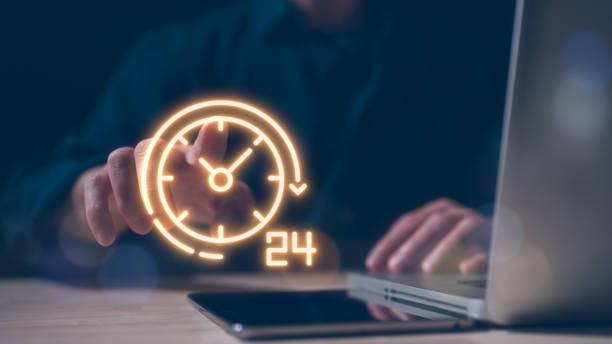 istock Time management project planning business internet technology concept, businessman working on office desk using computer pressing on virtual clock icon 2151692240