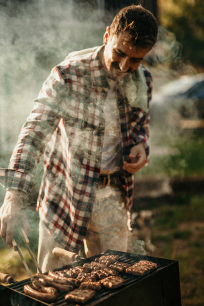 istock Portrait of a happy man making barbecue 2151692544
