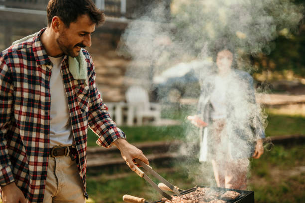 istock Portrait of a happy man making barbecue 2151692550